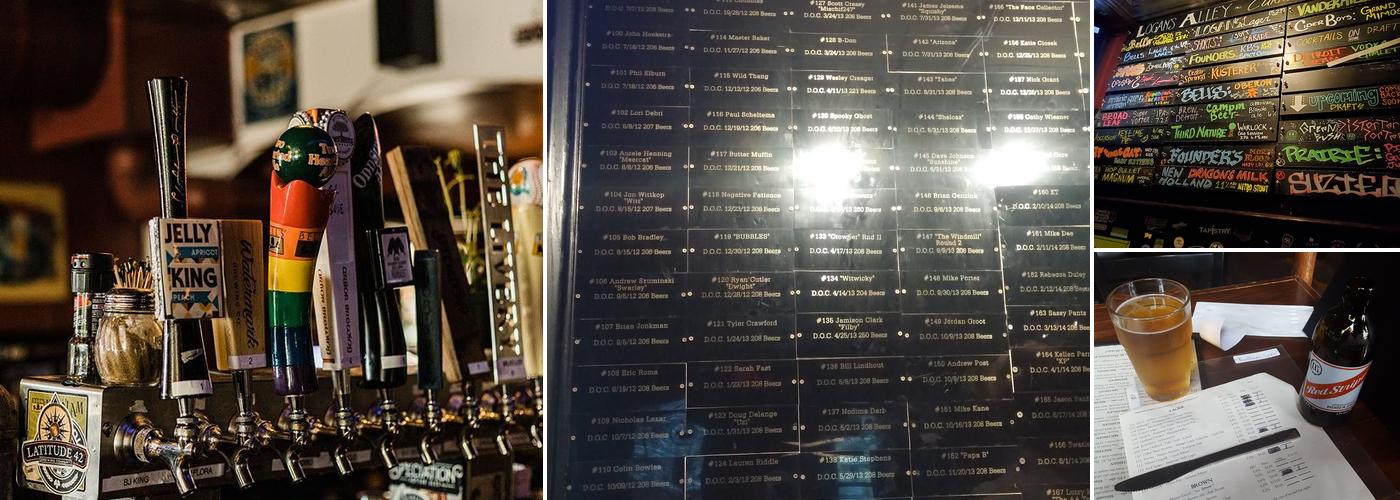 Logan's Alley tap handles, beer board, and a pint of amber beer